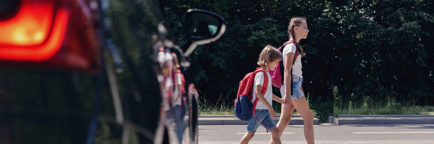 children walking on zebra crossing