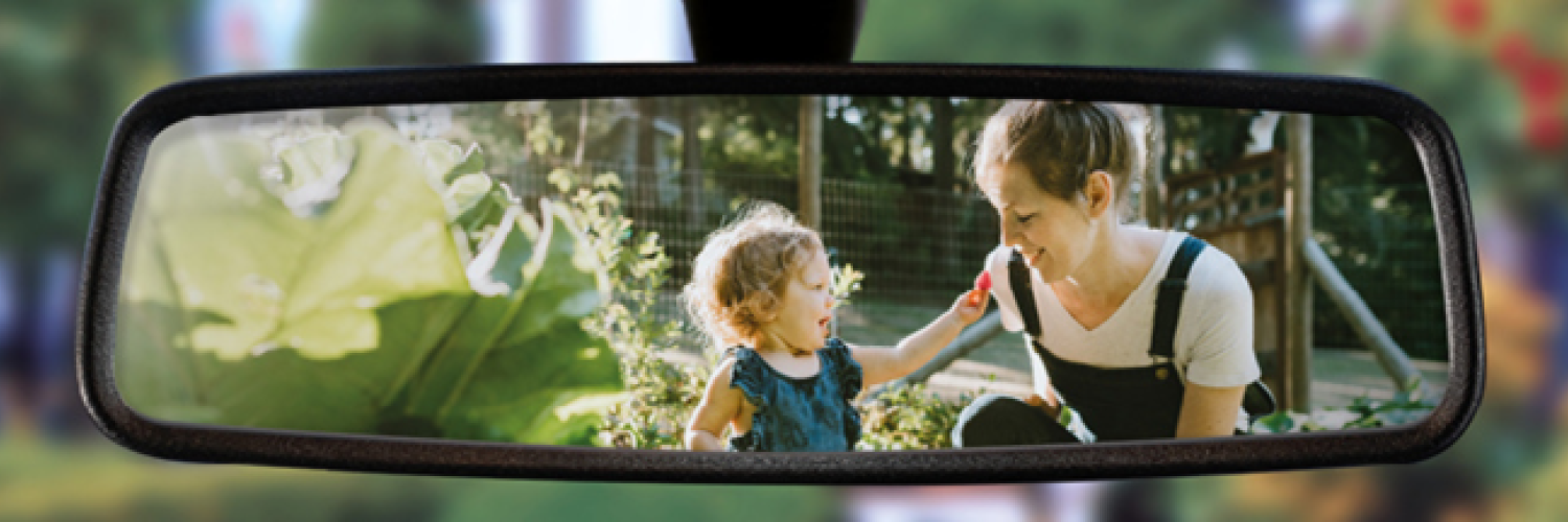 Mother and child in rear-view mirror